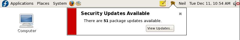 Fedora GNOME Desktop Top Panel with Update Message